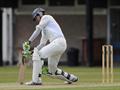 Giles Holmes edges a delivery to slip.jpg